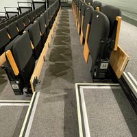 Showing the shallow steps down the aisle and the wide rows