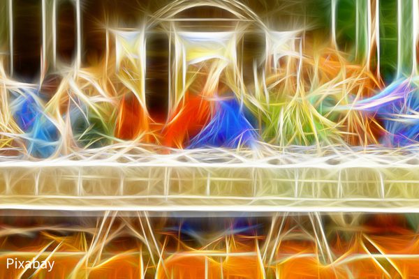 abstract interpretation of the last supper by da Vinci, the rough shapes of the disciples are depicted by fibres of light
