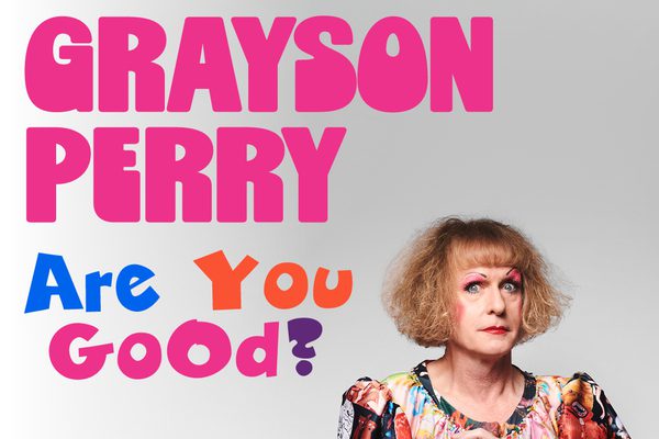 Grayson Perry wearing a colourful dress.