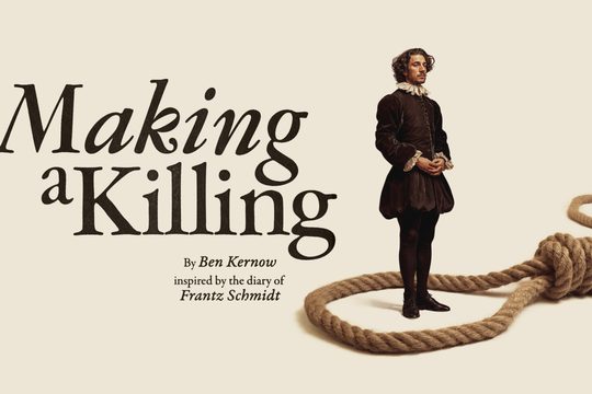 A man wearing a brown dress and tights with a ruffle round his next, standing inside a large noose.