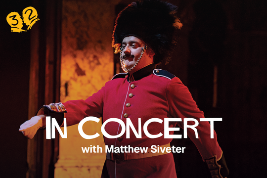 A man dressed in a King's Guard uniform.