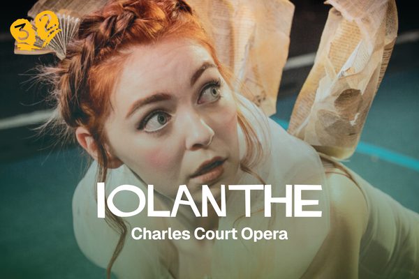 A fairy with red hair.