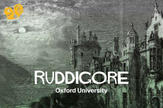 A castle with a dark sky. The moon is peeking through the clouds.