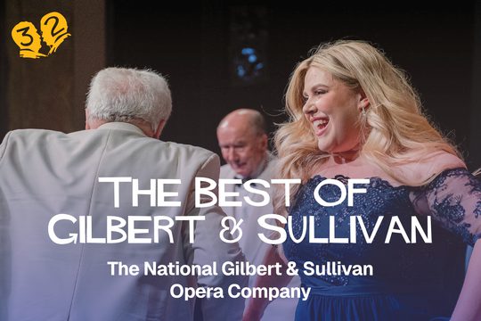 A man and a woman smiling and dancing with each other.