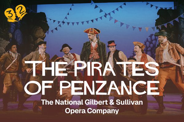 A group of men in pirate outfits holding swords.