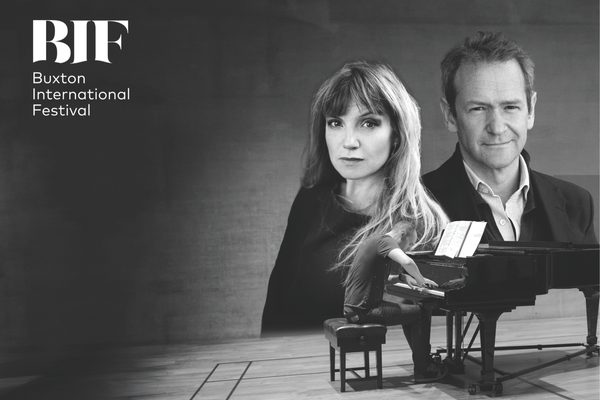 Alexander Armstrong and Claire both look to camera while a smaller image of Andrew Matthews-Owen plays the piano.