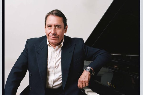 Jools Holland sat at a piano