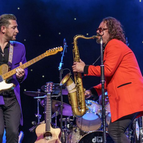 Guitarist and Saxophonist play to one another