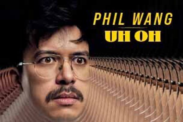 Phil Wang wearing glasses. The sides of his face are distorted.