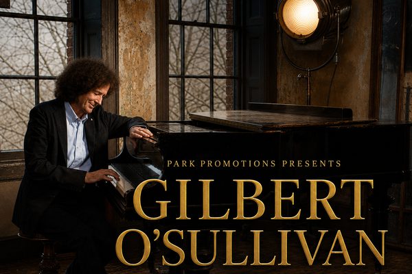 A man with curly hair wearing a black jacket sits at a grand piano. Gold text: Gilbert O'Sullivan, celebrating 60 years of music.