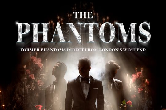 Three men in suits standing in smoke, next to roses and candles.