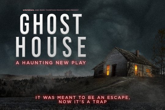 A dark and stormy night with a wooden house. Orange light floods through the windows. Text: Ghost House, a haunting new play.