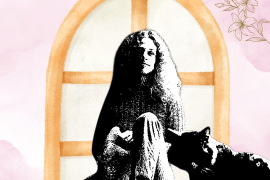 Black and white grainy photo of a woman in a jumper and jeans sitting with a cat. The image is in front of an illustrated window on a pale pink background.