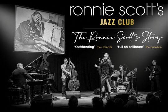 Black and white image of a band playing on a stage, with a singer, piano, double bass, drums, and saxophone. Text: Ronnie Scott's Jazz Club.
