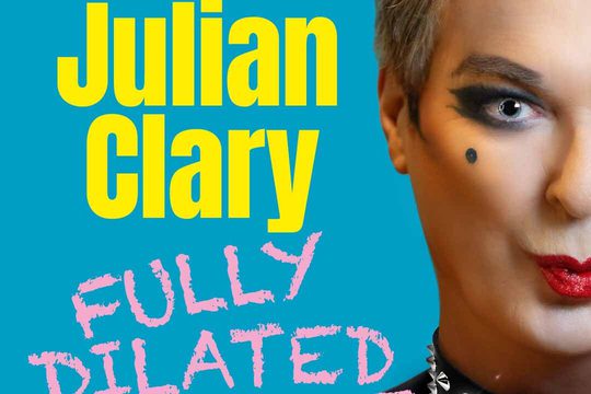 A bright teal background with a person with heavy eye makeup and red lipstick pouting, Yellow and pink text: Julian Clary, Fully Dilated.